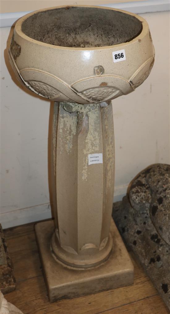 An Art Nouveau glazed stoneware garden planter H.84cm